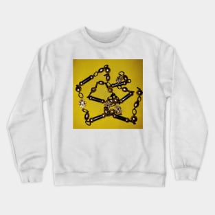 Pearls, black beads, and chains, on a deep yellow background Crewneck Sweatshirt